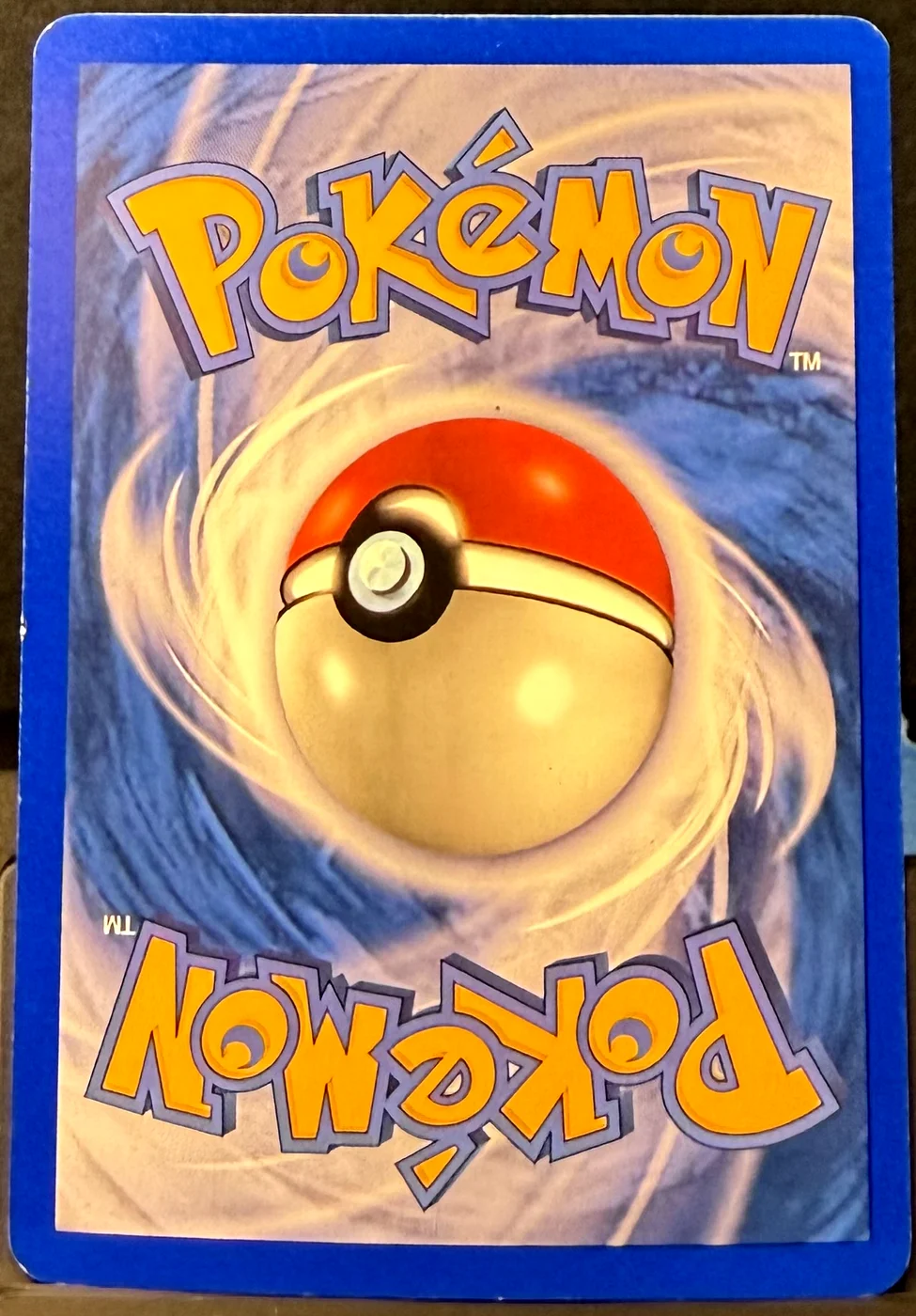 Back of a Pokémon card in Lightly Played condition.