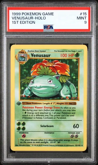 PSA 9 Venusaur holo from the 1999 Base Set. The PSA label reads 1999 POKEMON GAME, VENUSAUR-HOLO, 1ST EDITION, and the Edition 1 stamp is visible below the left corner of the illustration.